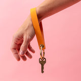 Tangerine Matte Vachetta Leather Wristlet