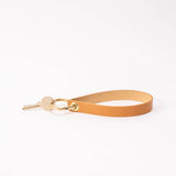 Sandy Tan Pebbled Leather Wristlet