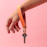 Coral Pebbled Leather Wristlet