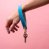 Peacock Matte Vachetta Leather Wristlet