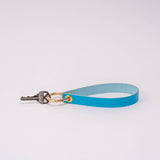 Peacock Matte Vachetta Leather Wristlet