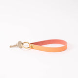 Coral Pebbled Leather Wristlet